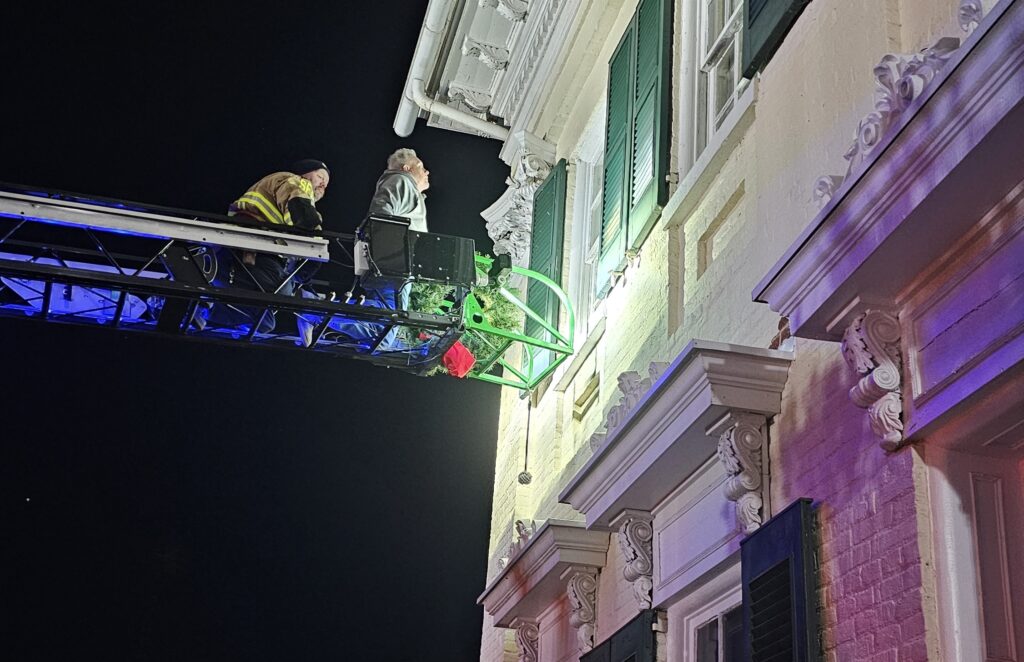 fire-department-helps-finish-mcmurran hall-christmas-decoration