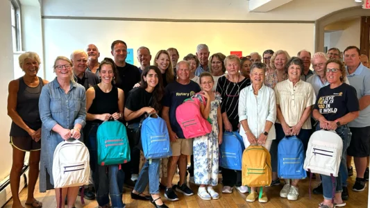 Filling Backpacks, Building Community: Volunteers gather at the Shepherdstown Community Club to prepare school supplies for 150 local children.
